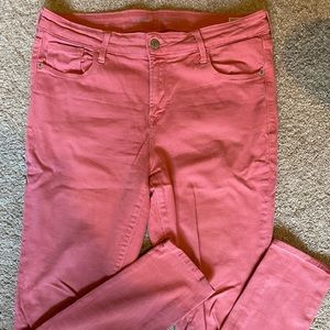 Mid-rise rose colored skinny rockstar jeans